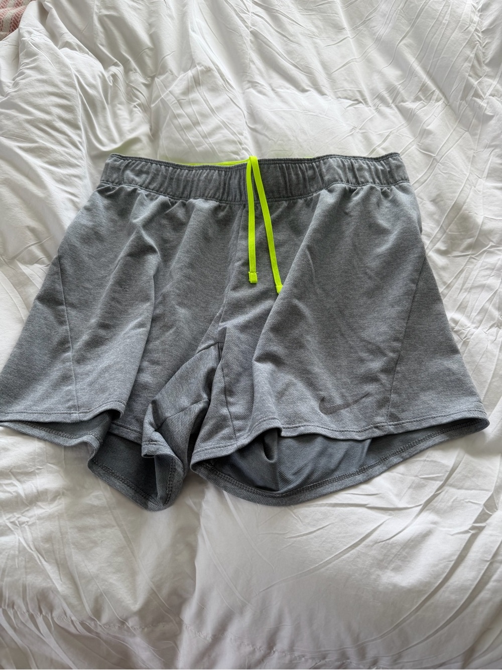 Nike Women's Gray Athletic Shorts with Neon Yellow Drawstring